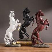 Three glossy resin horse statues in white black and maroon rearing on rocky bases decorbites horse statue for living room decor