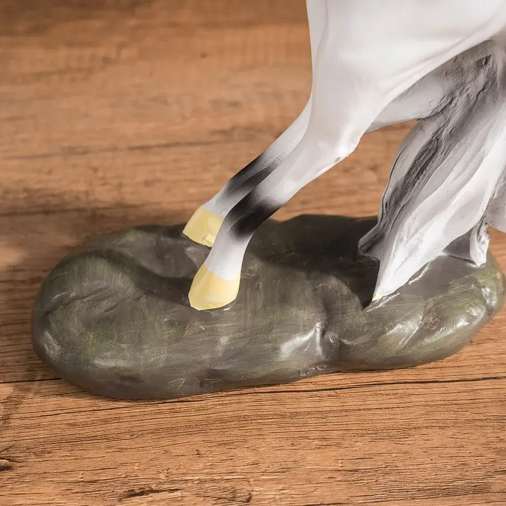 Modern glossy resin horse statue decorbites horse statue with white body and black gray leg markings on dark green base