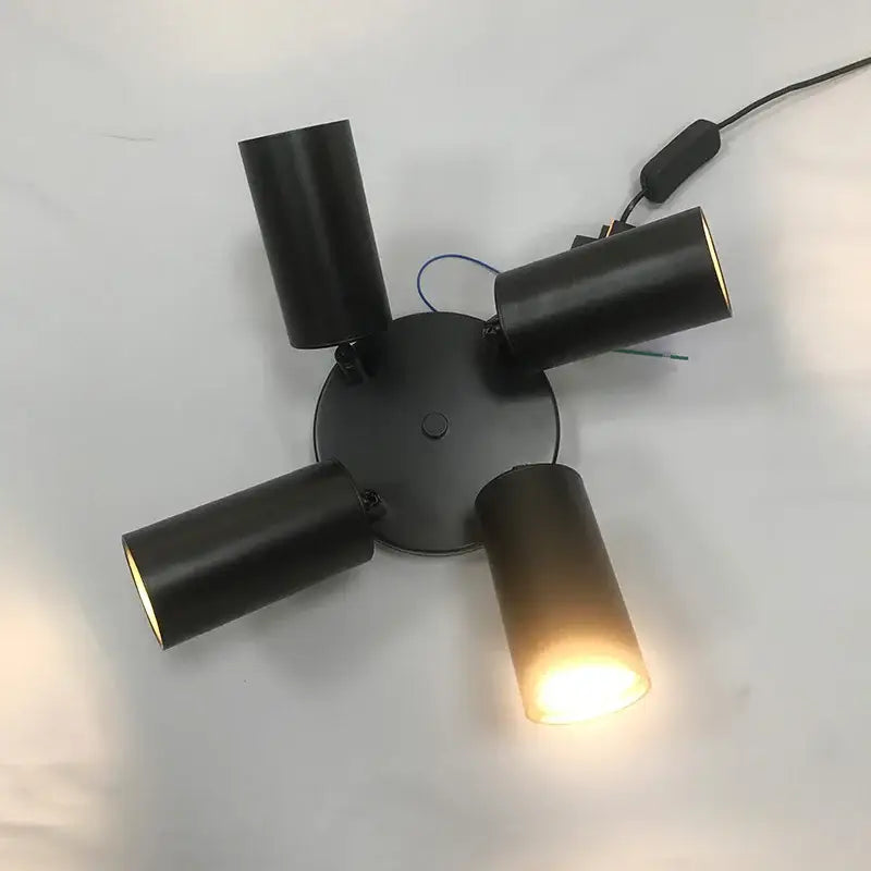 Black cylindrical ceiling lamp with four adjustable arms and central mounting plate decorbites adjustable led chandelier