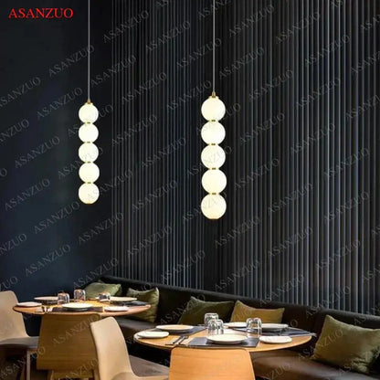 Two elegant modern gold 5-sphere glass ball pendant lights for dining room decorbites glass ball pendant cascade