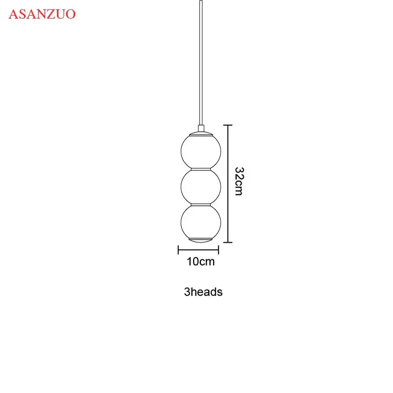 Modern gold Asanzuo three-head pendant light with spherical glass shades and slender rod for dining room decorbites glass ball pendant