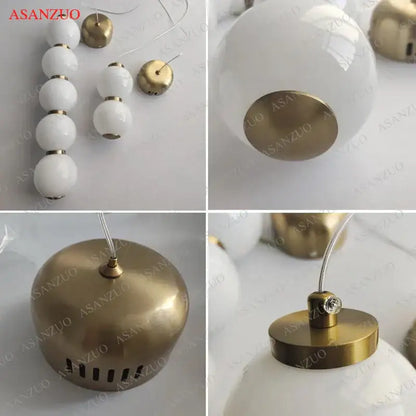 Modern gold 5-sphere glass ball pendant lights featuring white opaline glass globe and brass hardware for decorbites glass ball decor
