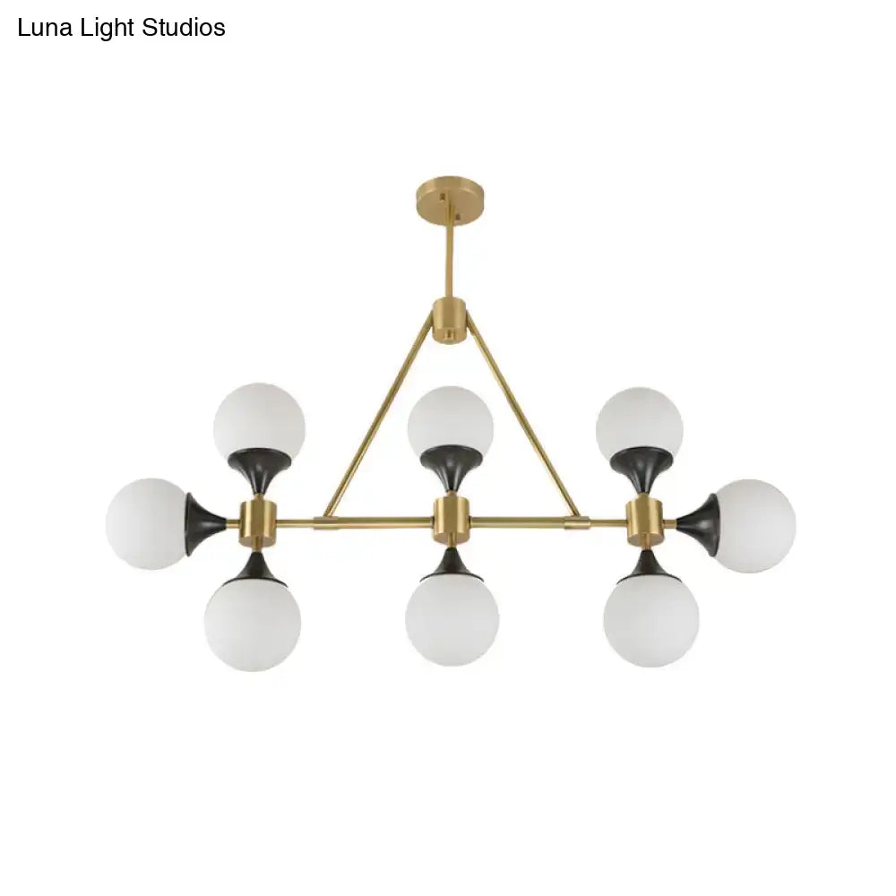 Modern gold metal chandelier with six frosted glass globe shades for island lighting and led incandescent use