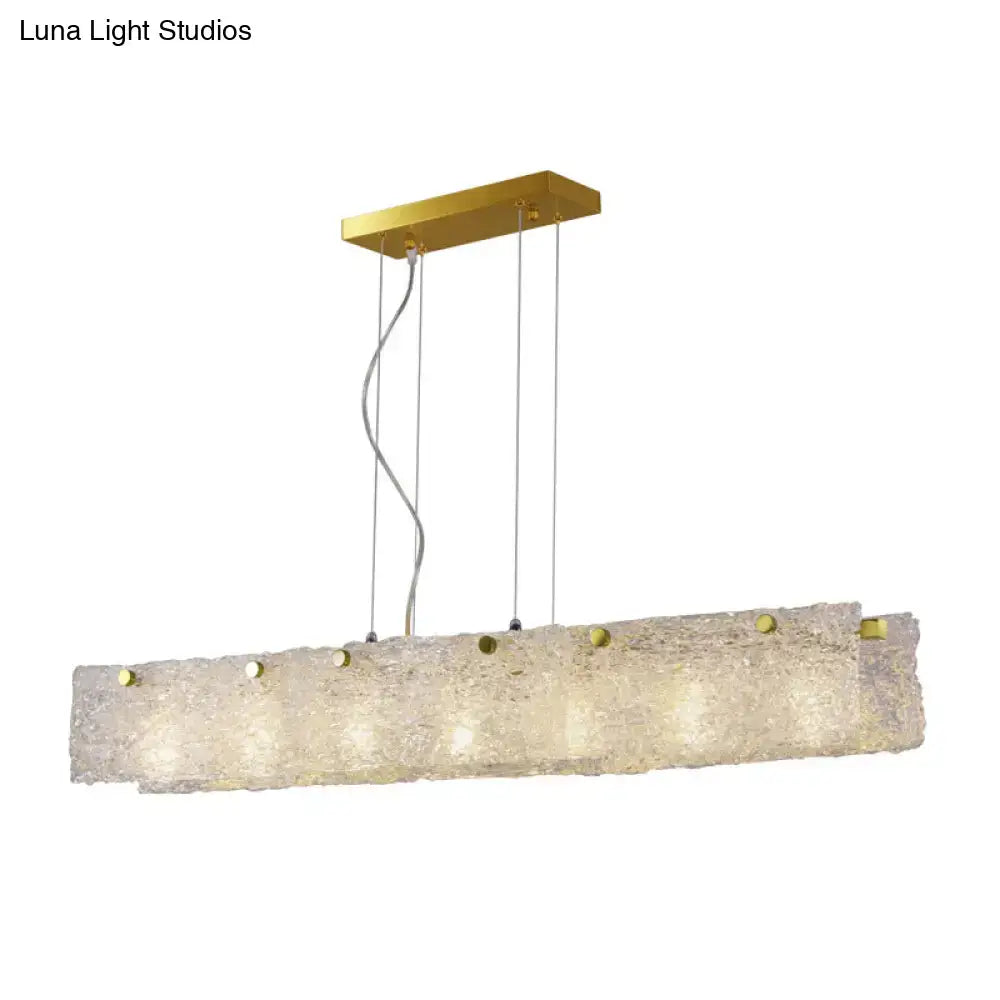 Gold-toned decorbites modern 9-light island pendant with transparent crackle glass and brass accents for 110v-120v use