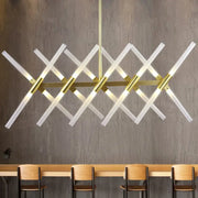 Decorbites™ contemporary tubular acrylic island light with 20 gold pendant heads and translucent acrylic rods in crisscross design