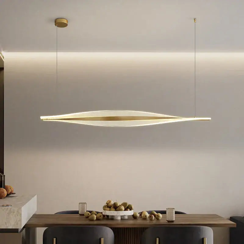 Modern gold acrylic led pendant lamp with linear design and warm ambient glow for dining room decorbites acrylic led