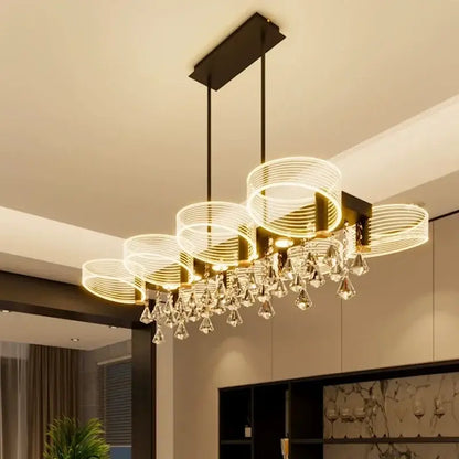Modern gold acrylic lustre chandelier with circular wireframe rings and crystal droplets for living room decorbites acrylic lustre