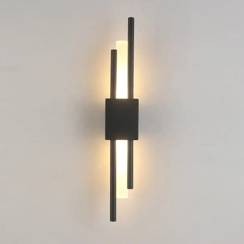 Modern black wall sconce with sleek vertical rods and warm lighting for bedroom use led wall lamp design