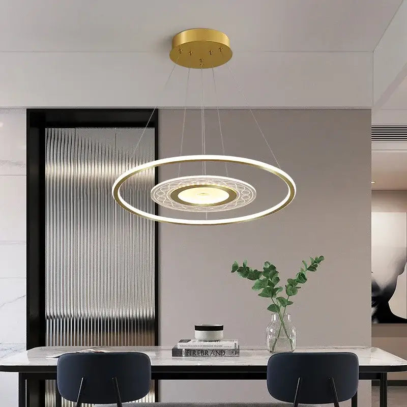 Modern gold acrylic remote control pendant light with concentric rings and illuminated central design for dining room decorbites acrylic remote control chandelier