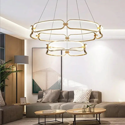 Modern gold adara luxury led chandelier with geometric layered circular rings for elegant dining room decorbites adara luxury