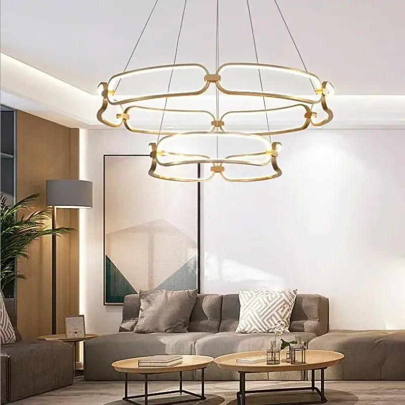 Modern gold adara luxury led chandelier with geometric layered circular rings for elegant dining room decorbites adara luxury
