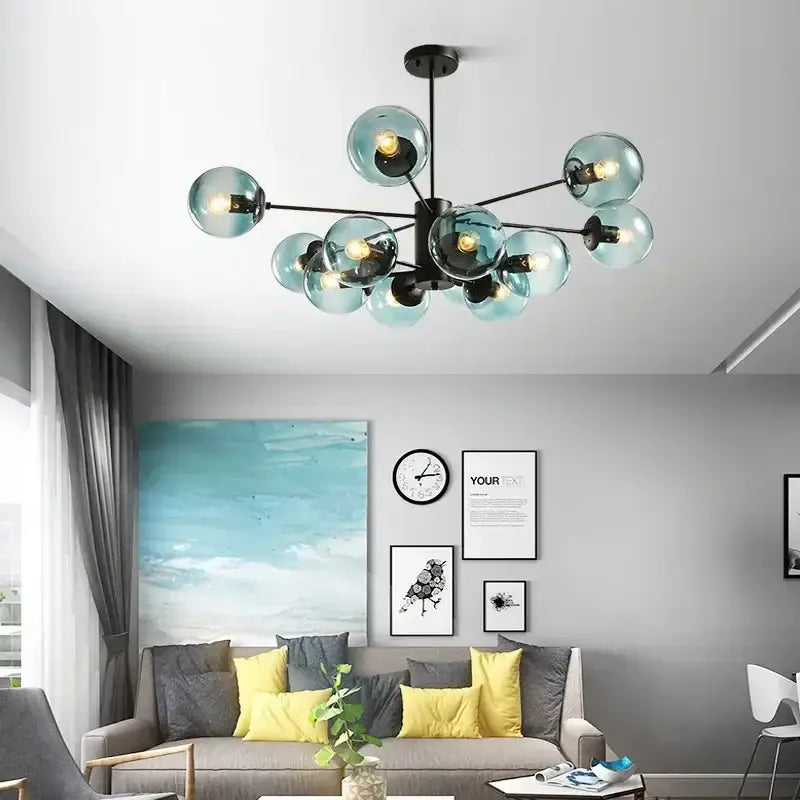 Modern chandelier with multiple translucent teal glass globes and black metal arms for decorbites adjustable ball glass lustre