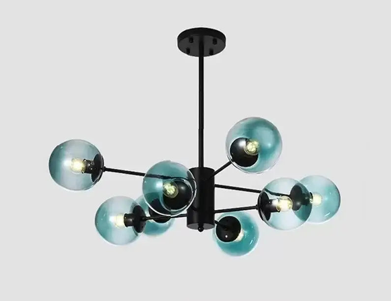 Modern black metal chandelier with eight translucent teal glass globe shades featuring decorbites adjustable ball glass lustre design