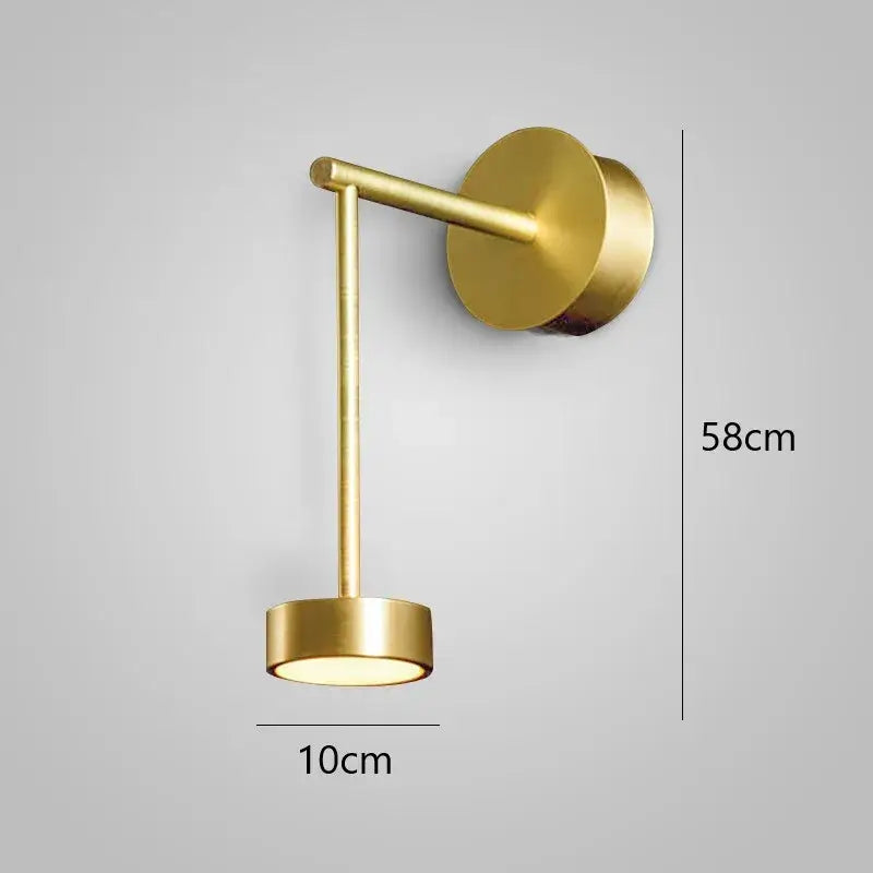 Modern gold adjustable direction wall lamp with sleek cylindrical design and gold finish by decorbites wall light