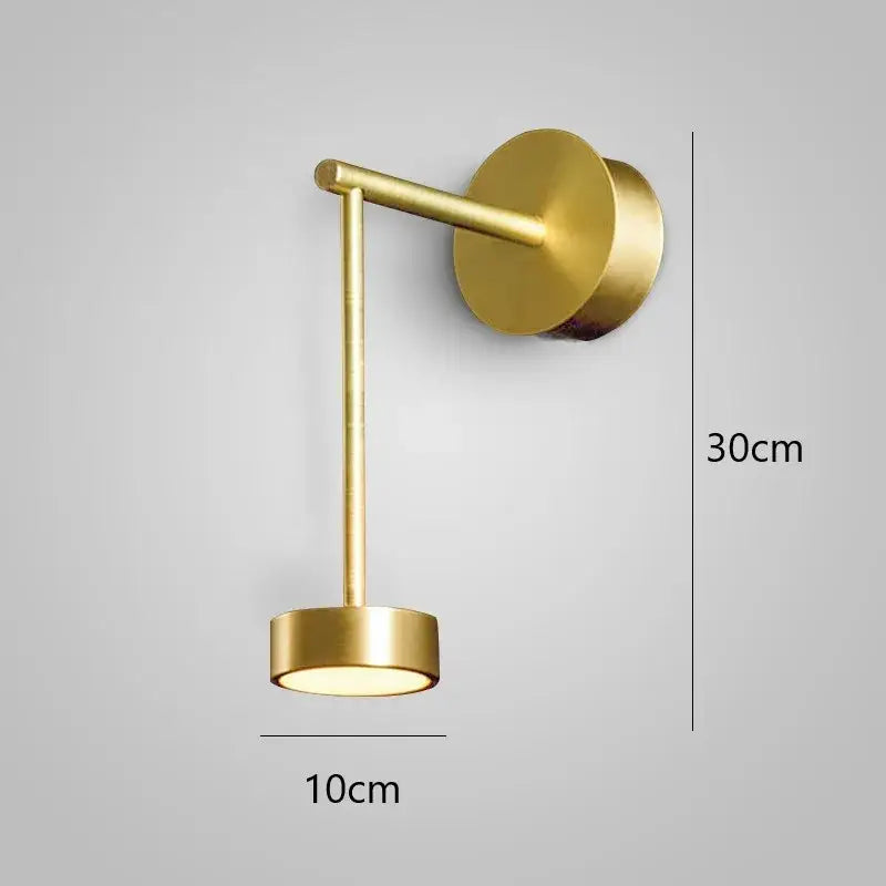 Modern gold adjustable direction wall lamp with a gold-finished minimalist cylindrical design by decorbites wall light