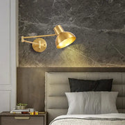 Modern gold adjustable led wall lamp with sleek adjustable arm and dome-shaped shade for bedroom reading decorbites wall lamp