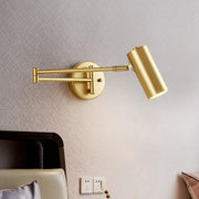 Modern gold decorbites adjustable long wall lamp with cylindrical head and articulated arm for bedroom reading light