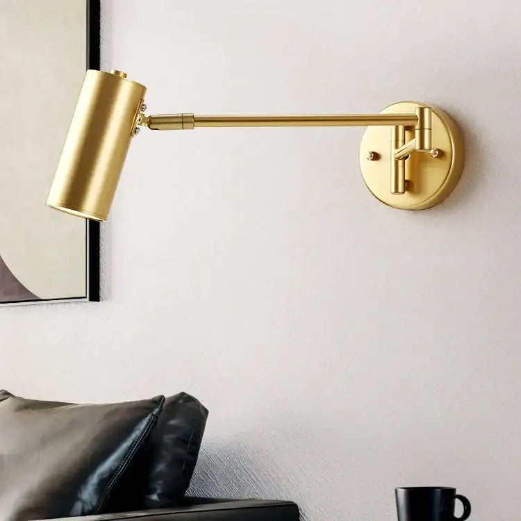 Modern gold wall lamp with adjustable long arm and cylindrical head for bedroom reading from decorbites adjustable long series