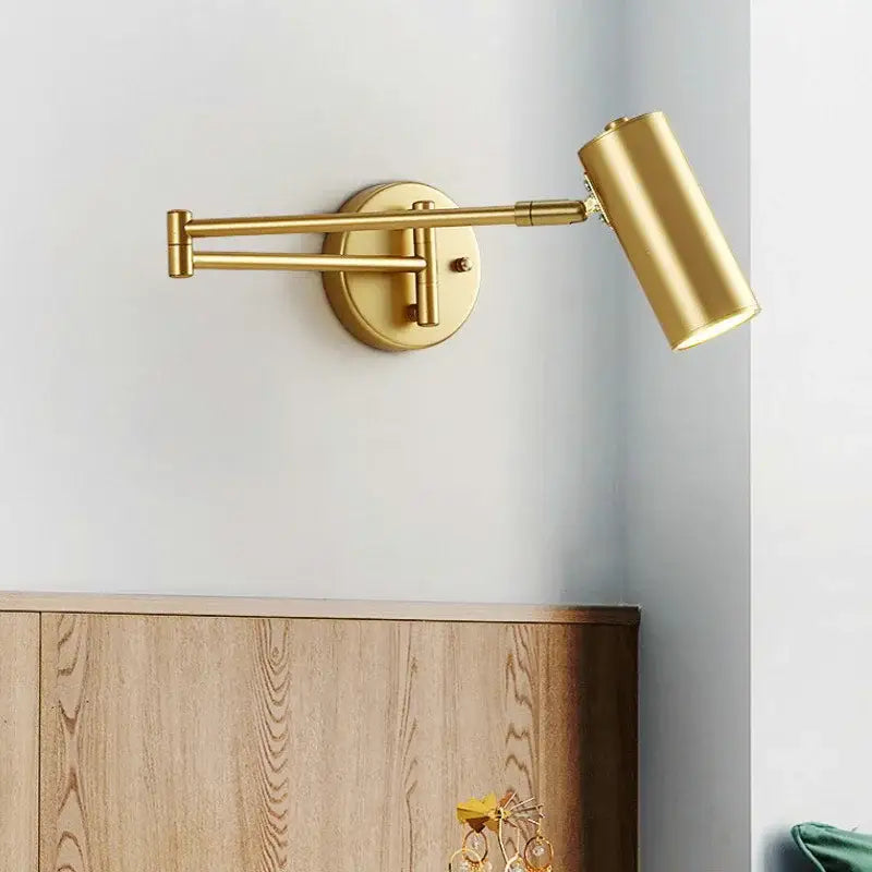 Modern gold wall lamp with adjustable long arm and cylindrical head for bedroom reading by decorbites adjustable long