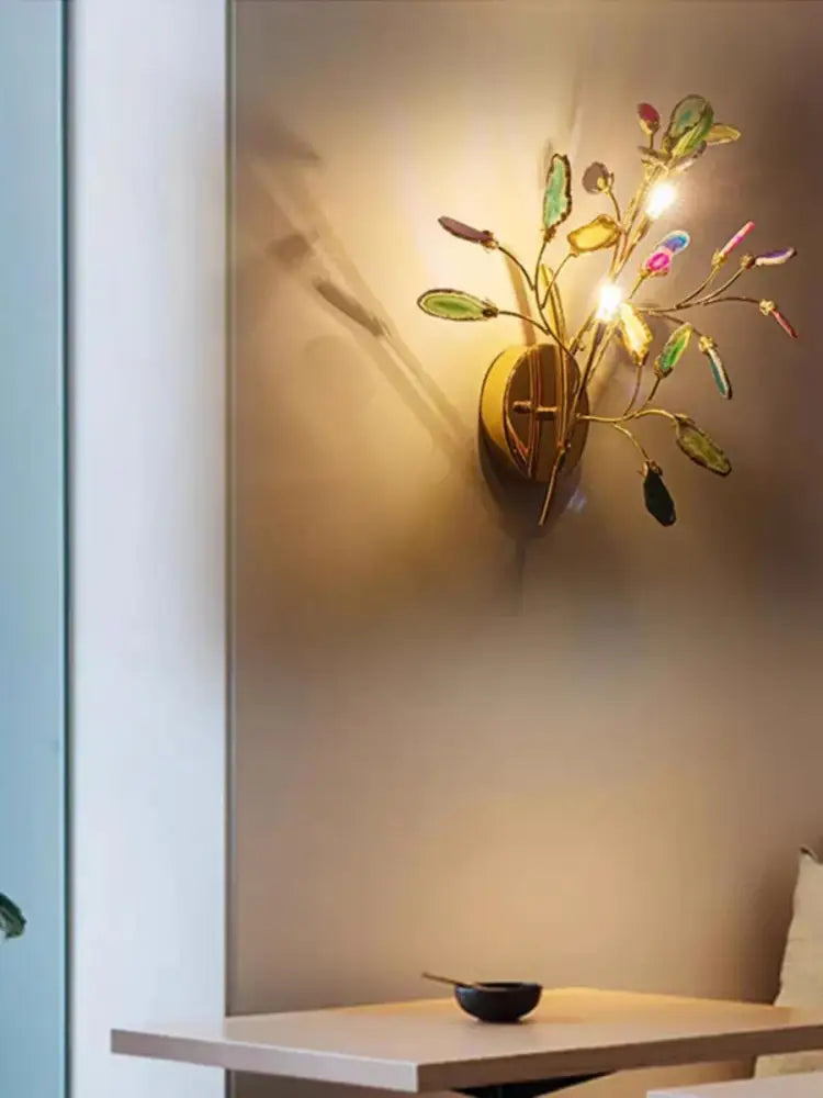 A modern gold agate led wall lamp sconce with branching arms and colorful translucent gemstone decorbites agate led leaves