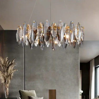 Modern gold amber decorbites crystal ceiling chandelier with translucent leaf-shaped glass and gold-toned metal accents