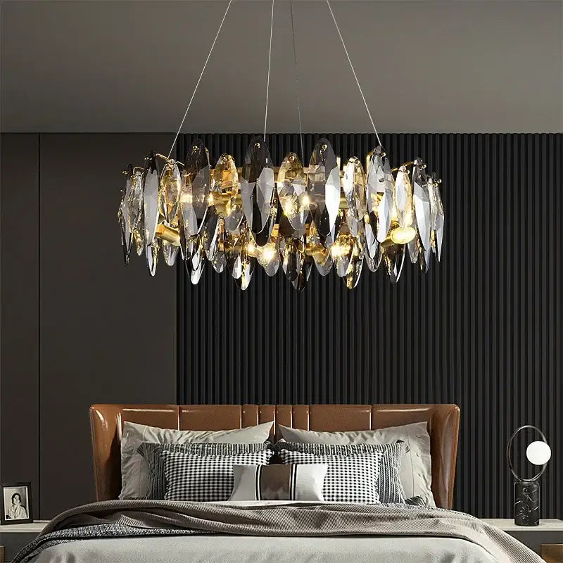 A modern gold amber decorbites crystal ceiling chandelier with translucent crystal shards for dining room lighting