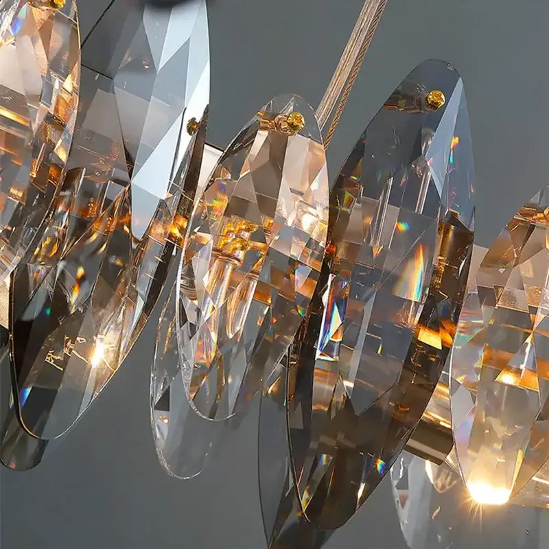 Elegant modern gold amber decorbites crystal ceiling chandelier with faceted transparent glass prisms for dining room