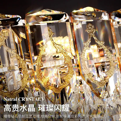 Modern gold and amber decorbites crystal chandelier with faceted clear crystals and intricate gold-toned designs for dining room light