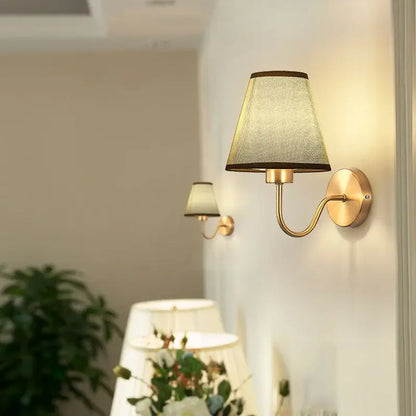 Modern gold and beige cloth led wall lamp with textured translucent beige lampshade and dark brown trim decorbites cloth led wall decor