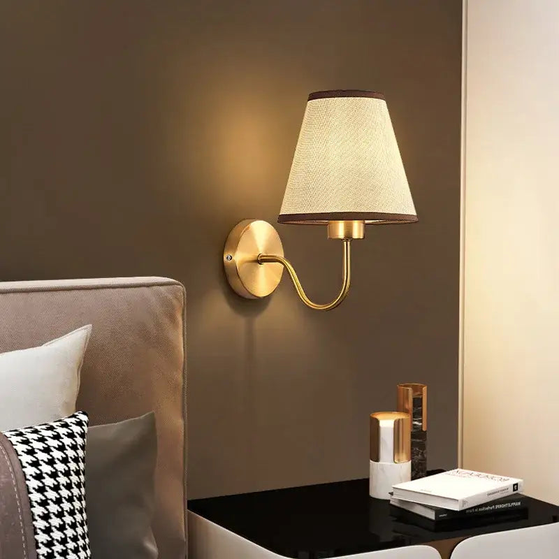 Modern gold and beige cloth led wall lamp with textured fabric shade for bedroom decorbites cloth led wall use