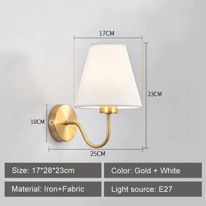 Modern gold and beige cloth led wall lamp with gold-toned iron base and white fabric shade for bedroom decorbites cloth led