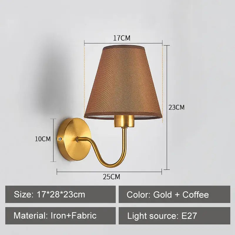 Modern gold and beige cloth led wall lamp with gold-toned iron frame and tapered coffee-colored fabric shade for bedroom decorbites cloth led