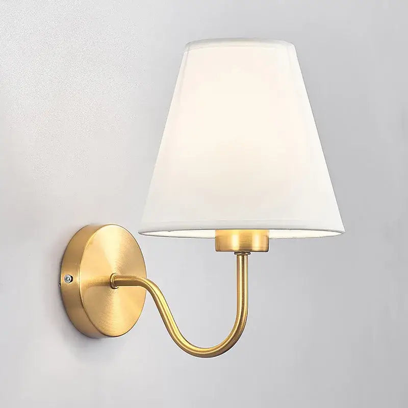 Modern gold and beige cloth led wall lamp with gold-toned sconce and white fabric shade for bedroom decorbites cloth led