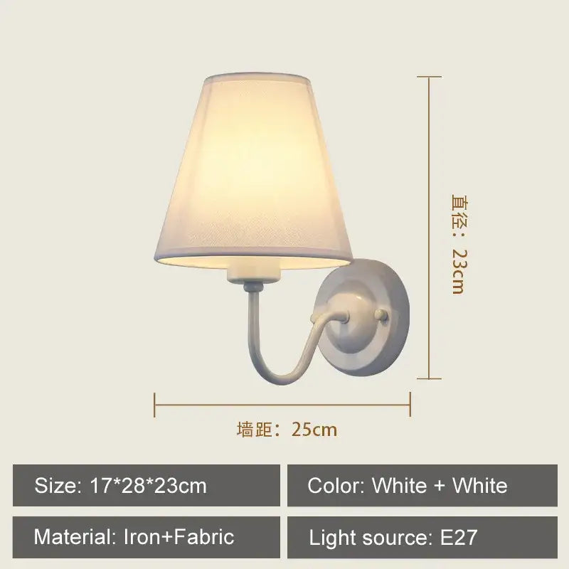 White iron wall lamp with tapered beige fabric shade from decorbites cloth led wall collection for modern bedroom decor