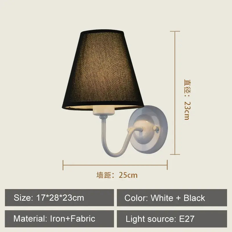 White iron wall lamp with black textured fabric shade featuring decorbites cloth led design for modern bedroom decor
