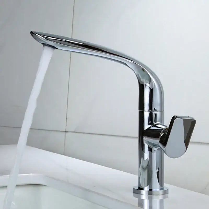 Modern gold and black decorbites basin faucet with chrome finish single-handle and sleek curved spout design for bathroom use