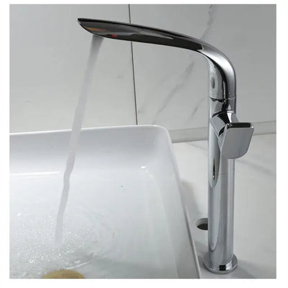 Chrome finished modern waterfall basin faucet with sleek curved spout and rectangular handle by decorbites basin faucet