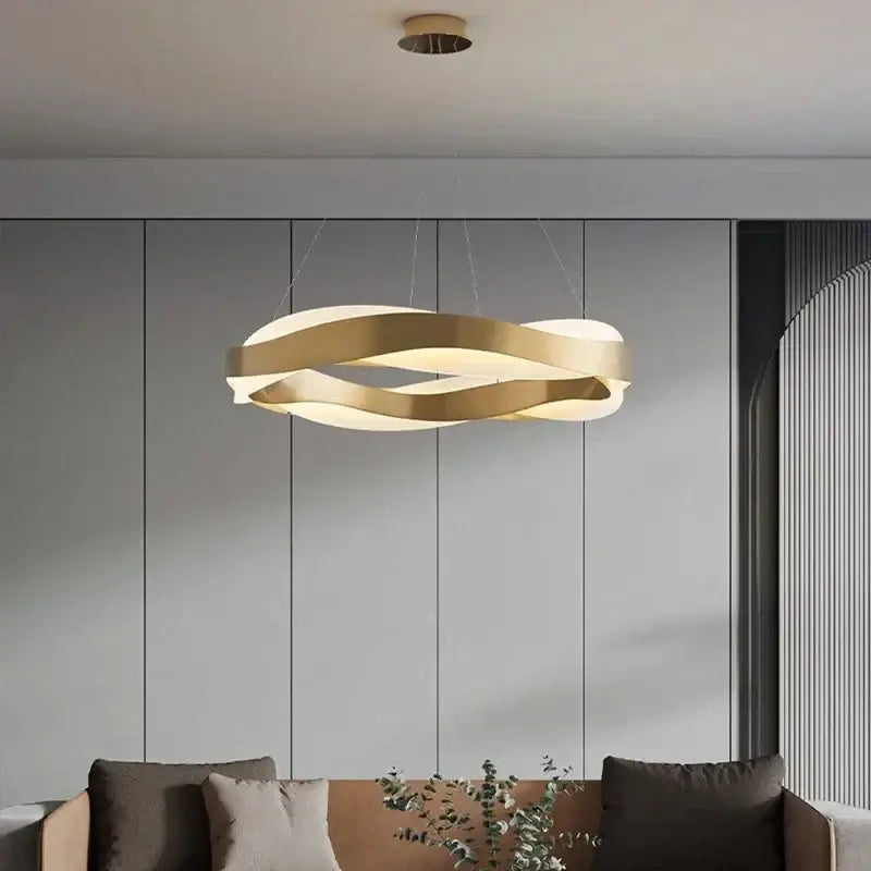 Modern gold and black circle chandelier pendant light with sleek intertwined rings for stylish dining room decorbites black circle