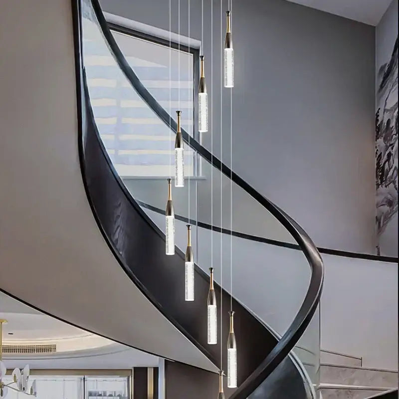 Modern gold and black decorbites crystal chandelier with slender glass bodies and metallic tops for living room lighting