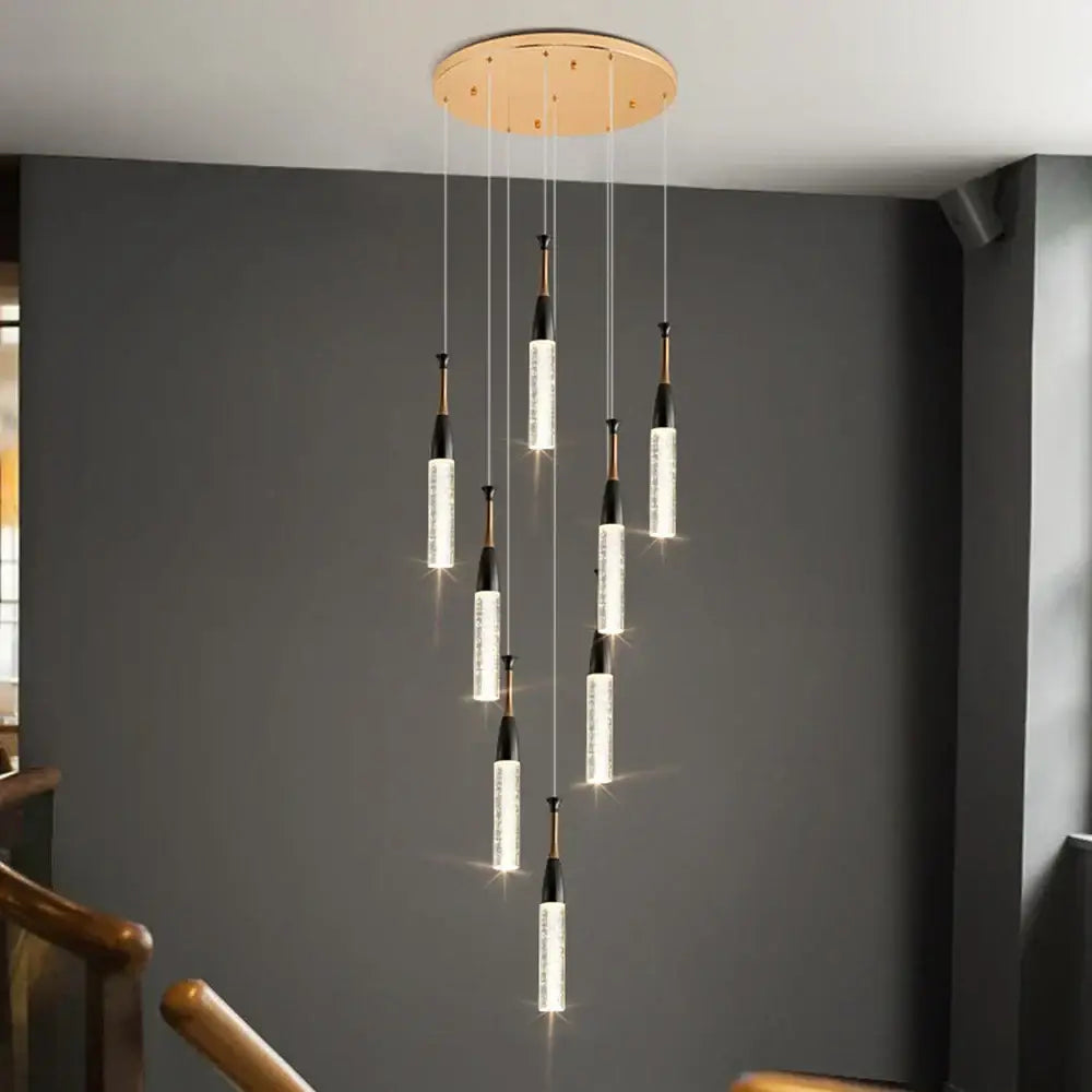 Modern gold and black decorbites crystal chandelier with cylindrical glass pendant lights for living room lighting