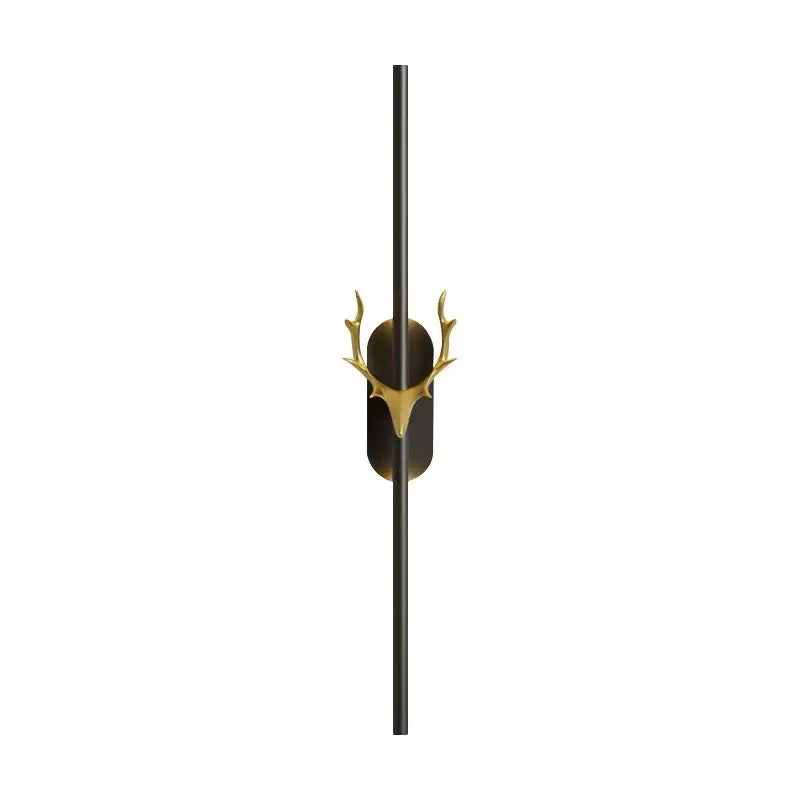 A sleek black wall lamp featuring a polished gold decorbites deer horn led design for modern bedroom decor