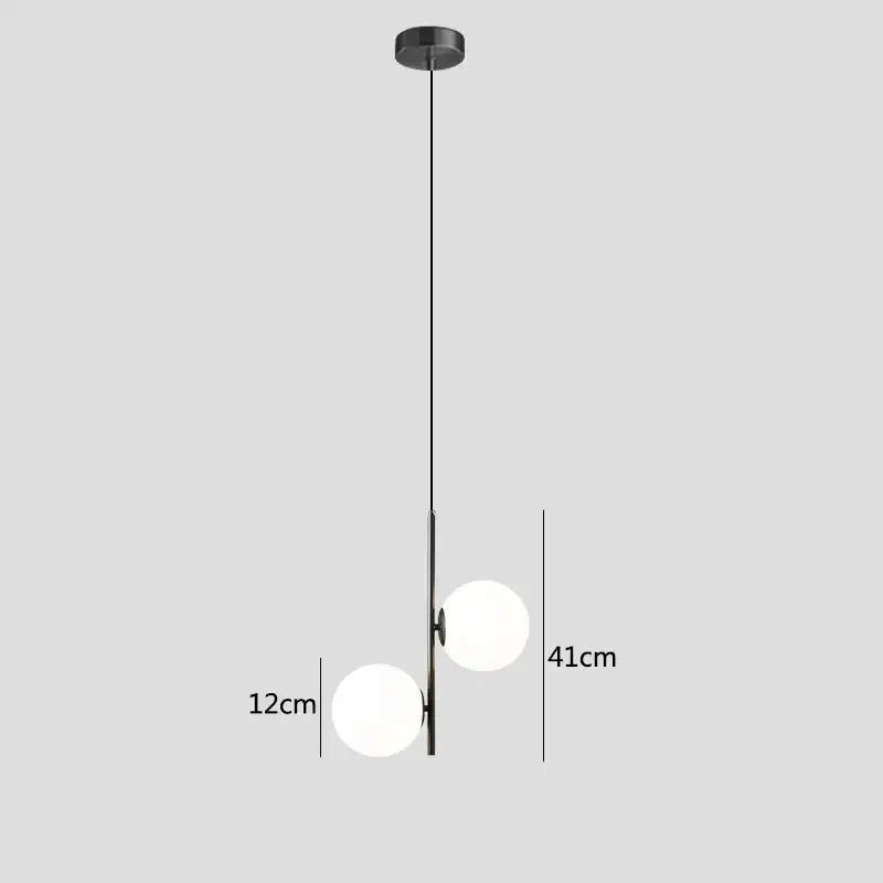 Modern black metal pendant light with two frosted glass spheres featuring glass ball led design for bedroom use
