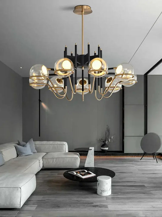 Modern gold and black glass ball pendant light with multiple spherical shades and black arms for living room decorbites