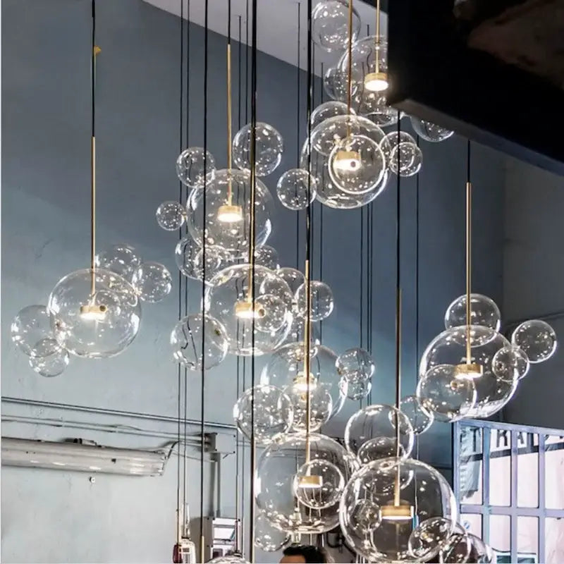 Modern gold and black decorbites glass chandelier with clear glass spheres and warm bulbs for living room pendant light