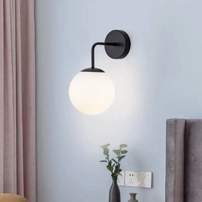 Black wall-mounted decorbites brozen black led sconce with frosted glass globe shade for modern bedroom wall lights