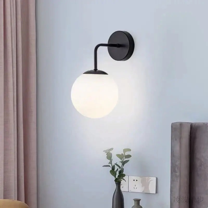 Black wall-mounted decorbites brozen black led sconce with frosted glass globe shade for modern bedroom wall lights