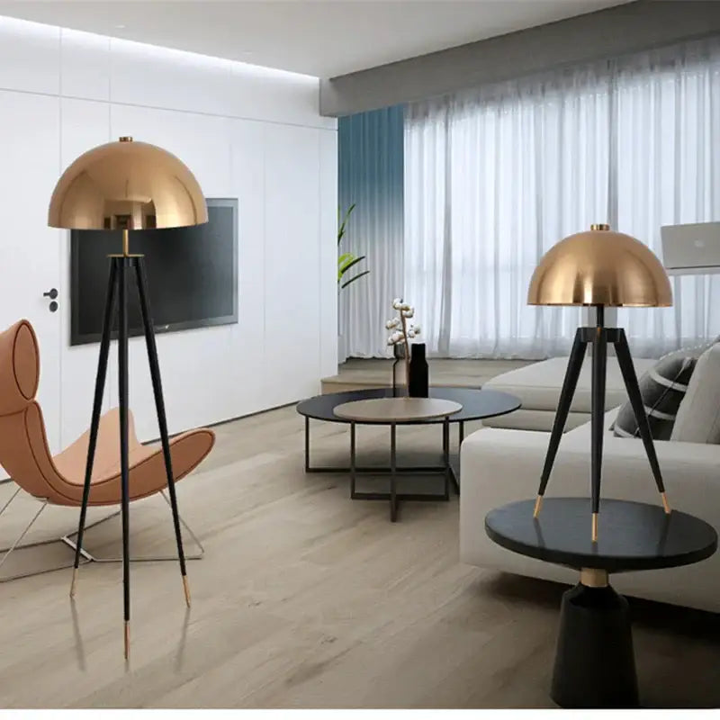 Modern gold and black decorbites coyote tripod floor lamp with gold dome shade for living room decor