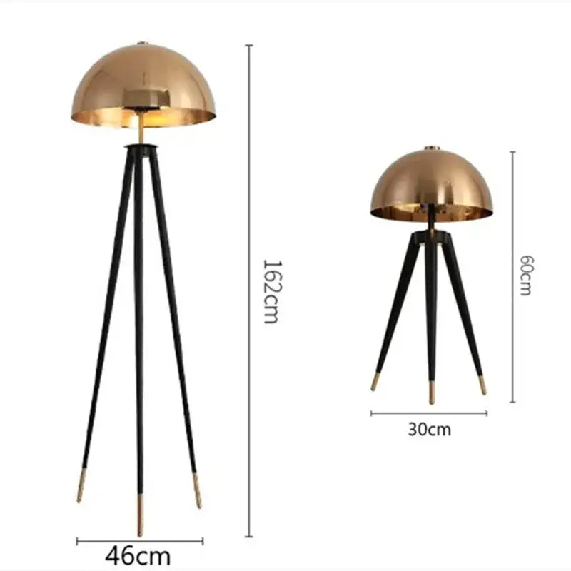 Modern gold and black tripod floor lamp with brass accents for living room decorbites coyote tripod design