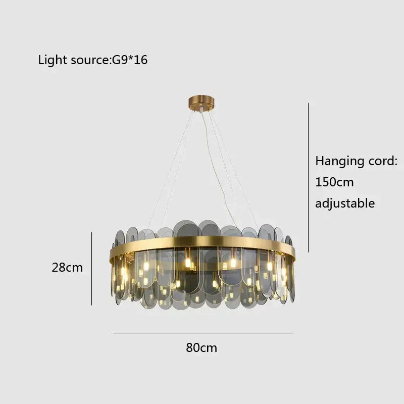 Modern gold and blue glass chandelier with circular frame and gray glass discs for elegant dining lighting solution