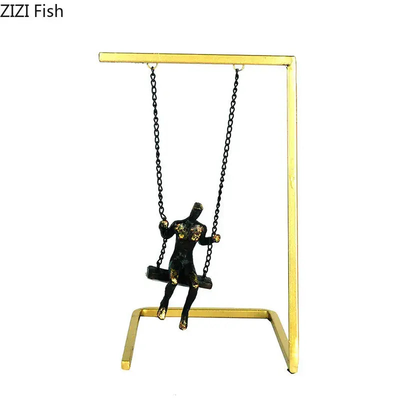 Black and gold modern golden swing metal sculpture mounted on golden metal stand for living room decorbites decor